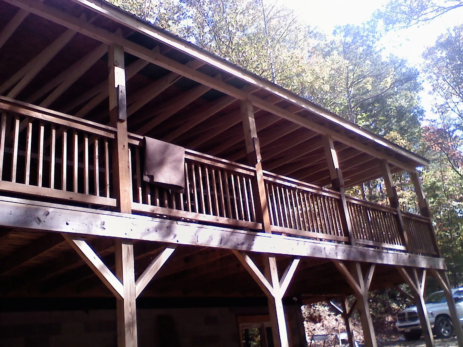 Timber framing under a new elevated porch and deck — Roof Leak Repair in Colo by Roofing Brothers